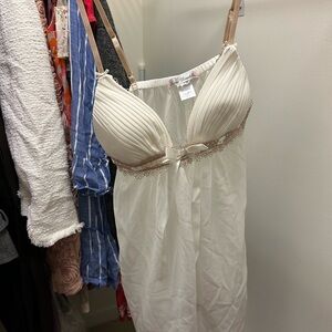 Cream lingerie with blush ruffle.